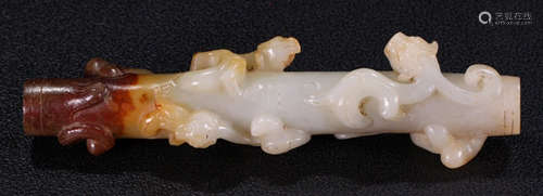 AN ANTIQUE JADE PENDANT CARVED WITH BEAST