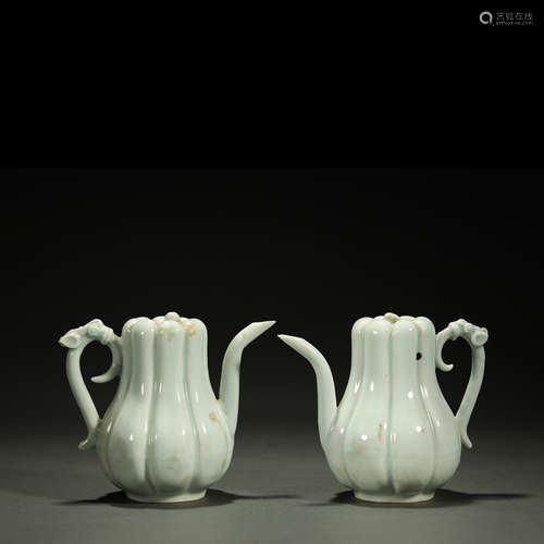 SONG DYNASTY,A PAIR OF CELADON-GLAZED POTS