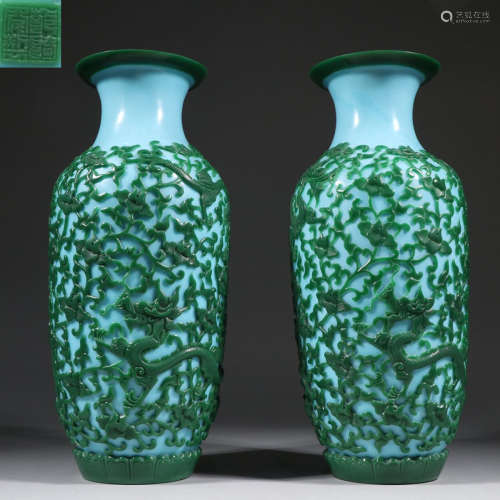 PAIR OF GLASS CARVED FLORAL PATTERN VASES