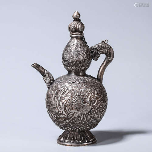 A dragon and phoenix silver ewer
