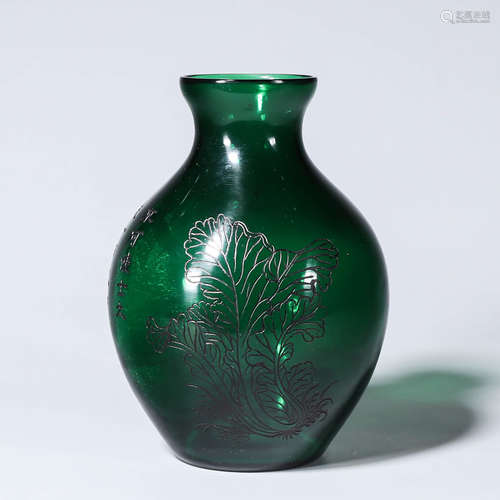 An inscribed glass vase