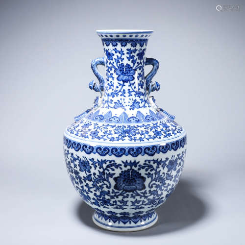 A blue and white interlocking lotus porcelain zun with ruyi ...