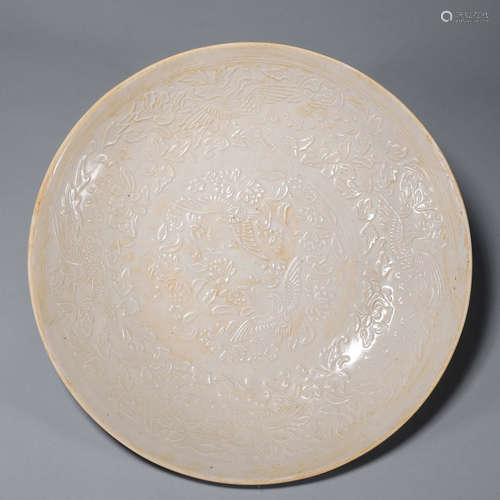 A Ding kiln interlocking flower and crane porcelain plate