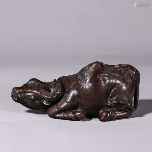 A fragrant rosewood carved cattle