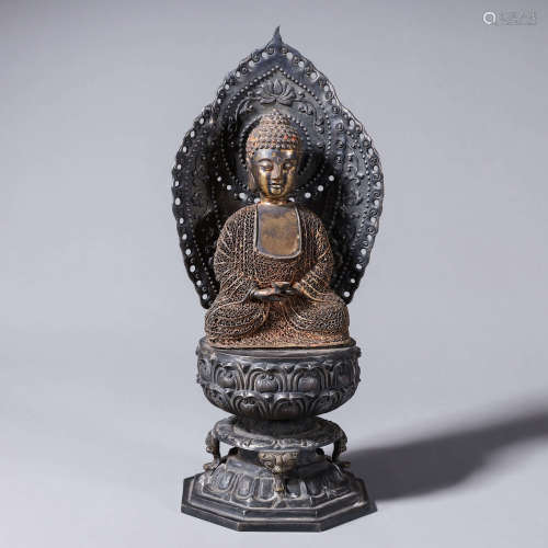 A silver Sakyamuni buddha statue