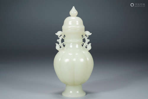 A Hetian jade vase with double flower shaped ears