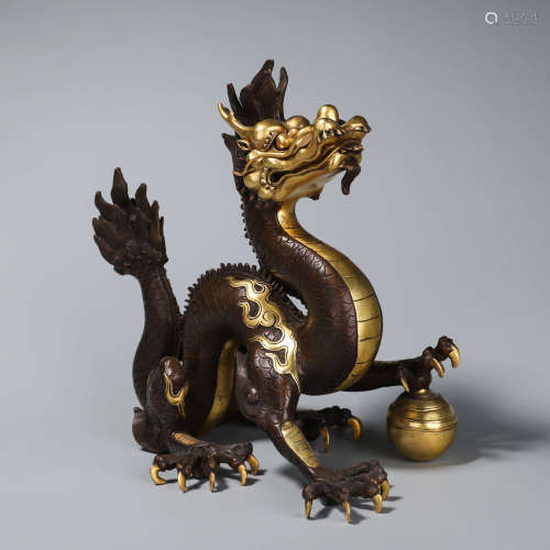 A gilding copper standing dragon ornament