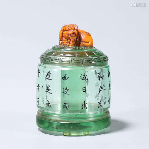 An inscribed glass thumb ring box