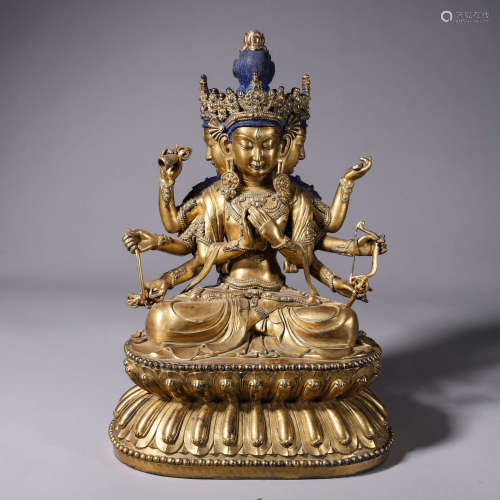A gilding copper eight-armed Guanyin bodhisattva statue