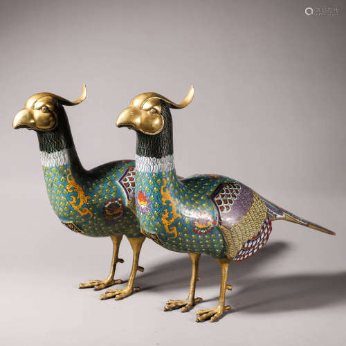 A pair of cloisonne peacocks