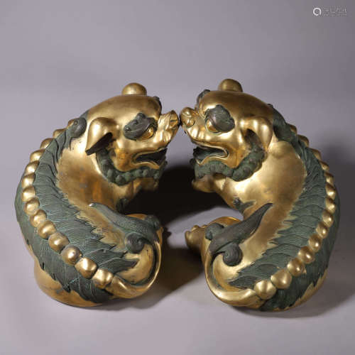A pair of cloisonne beasts