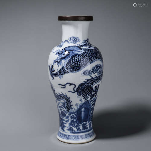 A blue and white cloud and dragon porcelain vase