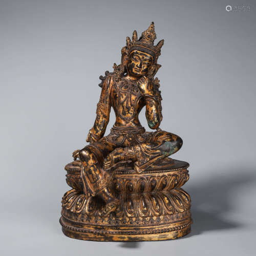A gilt copper tara buddha statue