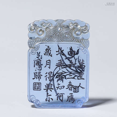 An inscribed orchid glass pendant