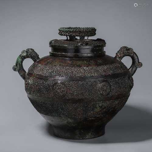 A kui dragon patterned bronze jar