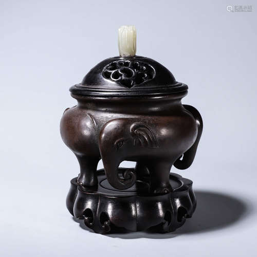 A red sandalwood jade-inlaid copper incense burner