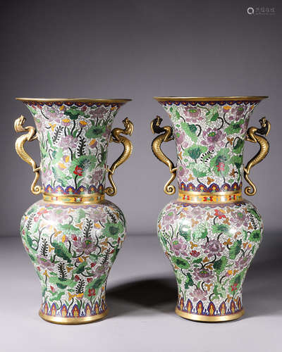 A pair of cloisonne floral vases with dragon-shaped ears