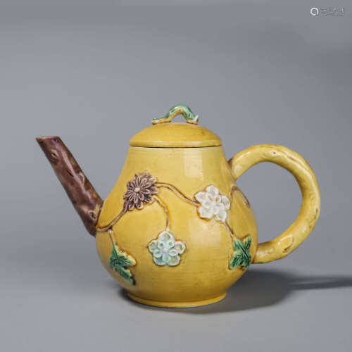 A yellow glazed flower porcelain teapot