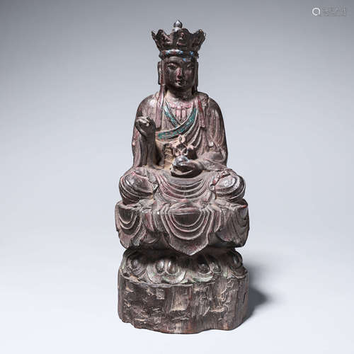 A rosewood carved buddha statuette