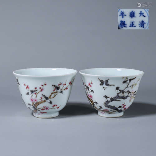 A pair of famille rose magpie and plum blossom porcelain cup...