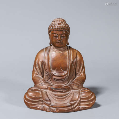 A fragrant rosewood carved Sakyamuni buddha statue