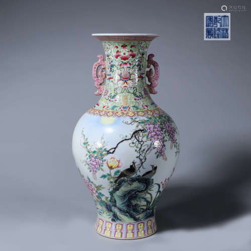 A famille rose bird and flower porcelain vase with dragon sh...
