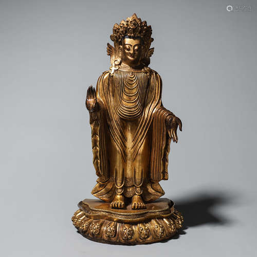 A gilding copper carved buddha statue