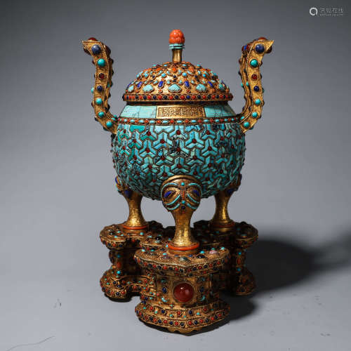 A gilding copper gem-inlaid three-legged pot