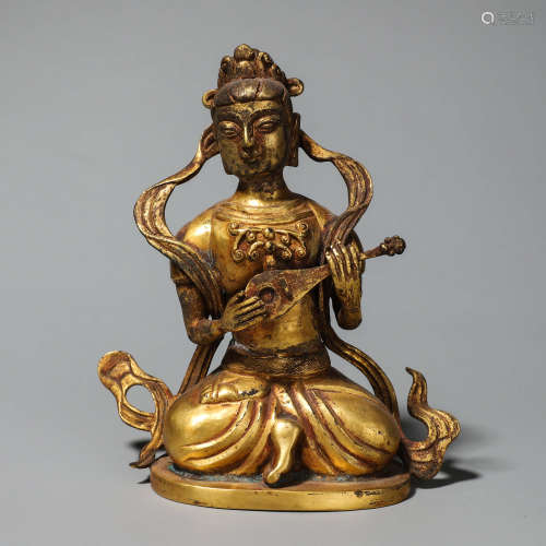 A gilding copper figure statue