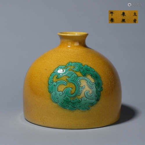 A yellow glazed green dragon and phoenix porcelain zun