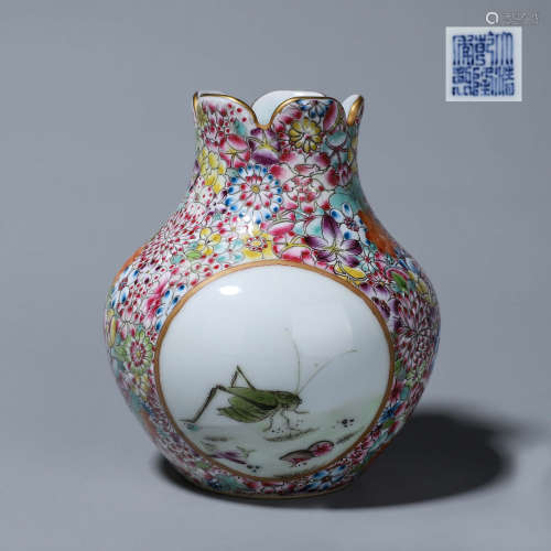 A famille rose flower and insect porcelain zun