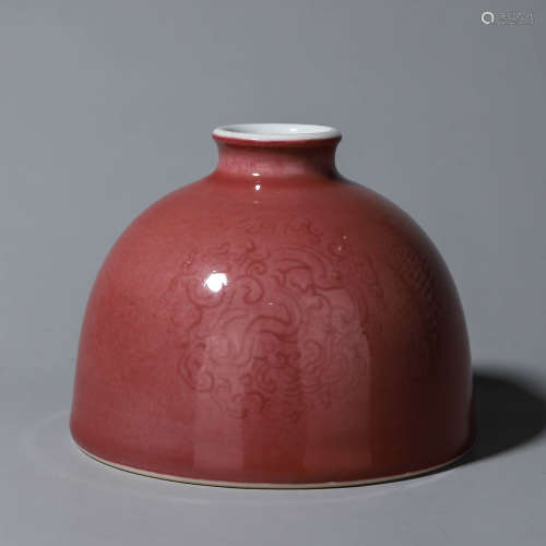 A red glazed dragon carved porcelain zun
