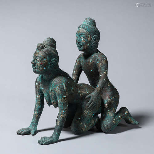 A pair of bronze figure ornaments