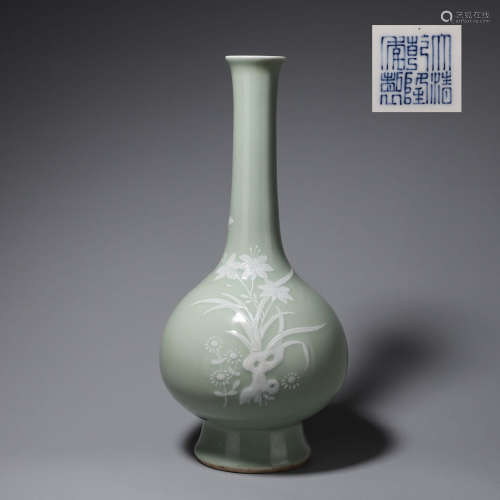 A white glazed plant porcelain vase