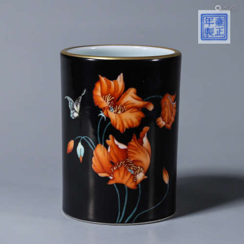 A black glazed famille rose flower and butterfly porcelain b...