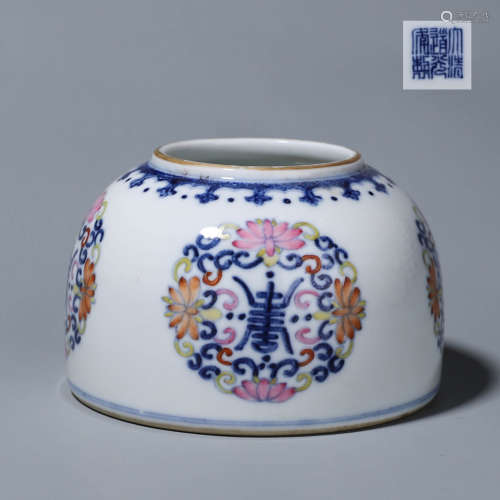 A blue and white inscribed porcelain zun