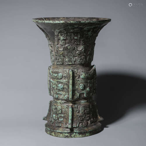 A taotie patterned bronze beaker vase