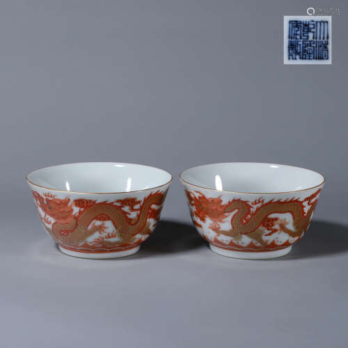 A pair of iron red gilt dragon porcelain bowls