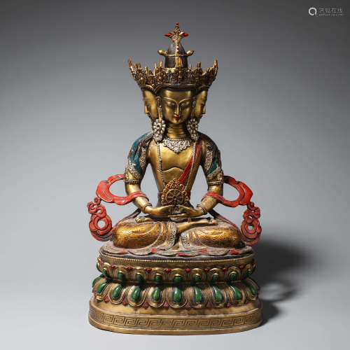 A copper sitting bodhisattva statue