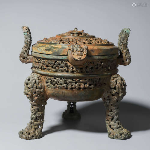 A kui dragon hollowed out bronze vessel