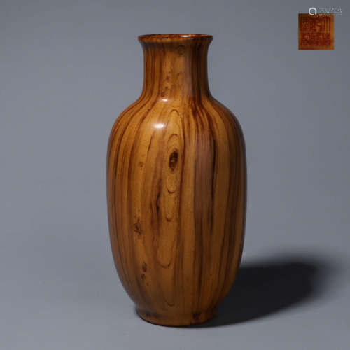 A porcelain olive-shaped vase