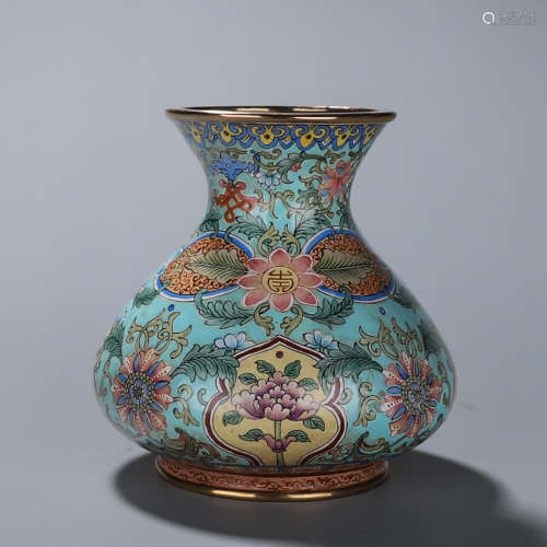 A copper enamel flower vase