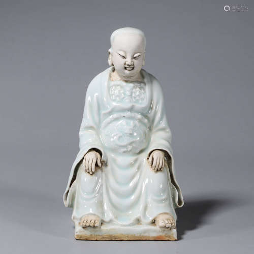 A Hutian kiln porcelain sitting buddha statue