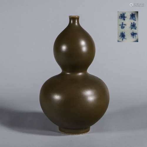 A tea dust glazed porcelain gourd-shaped vase
