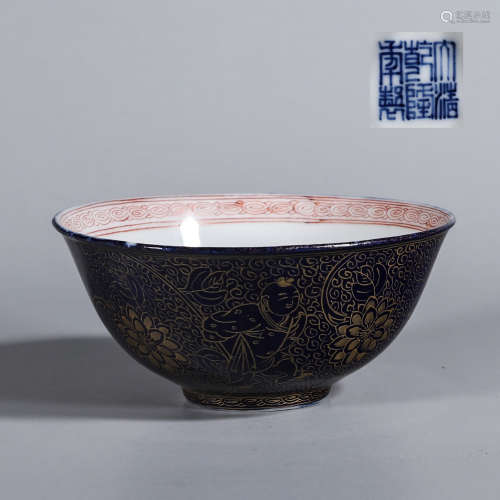 A gilt blue glazed figure porcelain bowl