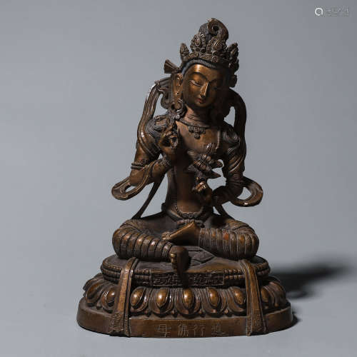 A copper tara buddha statue