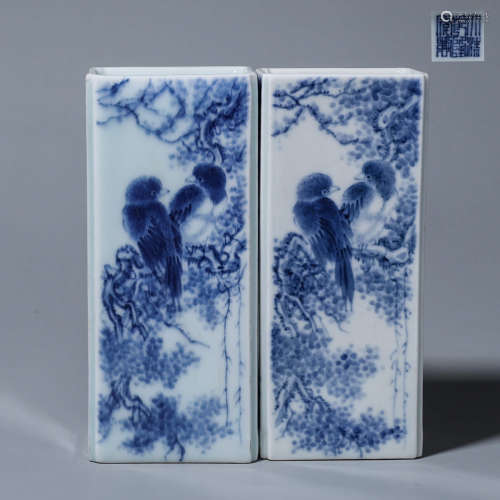 A pair of blue and white magpie and plum blossom porcelain b...