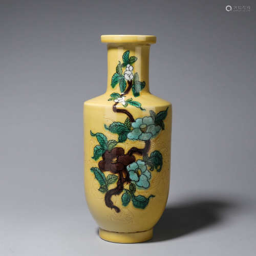 A yellow glazed dragon carved porcelain vase