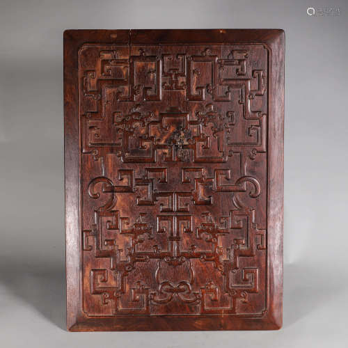 A carved fragrant rosewood plaque