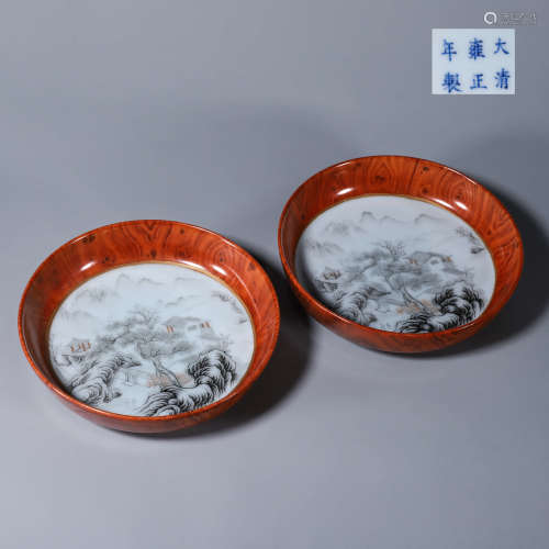 A pair of ink colored landscape porcelain plates